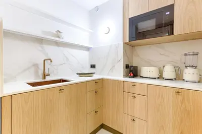 Cuisine ou kitchenette dans l'établissement MyKeypers - Luxurious flat 2BR-6p - Arc de Triomphe