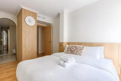 Un ou plusieurs lits dans un hébergement de l'établissement MyKeypers - Luxurious flat 2BR-6p - Arc de Triomphe