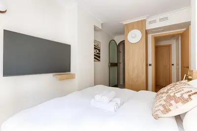 Un ou plusieurs lits dans un hébergement de l'établissement MyKeypers - Luxurious flat 2BR-6p - Arc de Triomphe