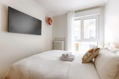 Un ou plusieurs lits dans un hébergement de l'établissement MyKeypers - Luxurious flat 2BR-6p - Arc de Triomphe