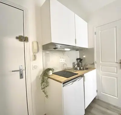 Cuisine ou kitchenette dans l'établissement New 124 Suite Anouck - Cosy Apartment Paris Center