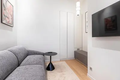 Télévision ou salle de divertissement dans l'établissement Le Confidentiel - Pigalle