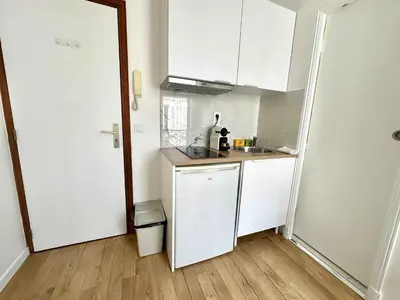 Cuisine ou kitchenette dans l'établissement New 134 Suite Piaf - Cosy Apartment Paris Center