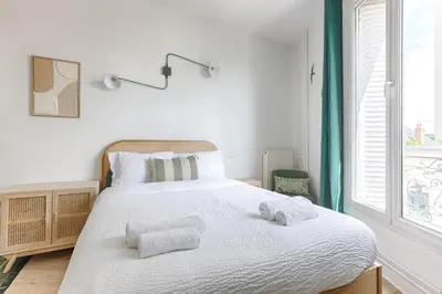 Un ou plusieurs lits dans un hébergement de l'établissement Mykeypers - Pleasant Studio 2P - Malakoff 22