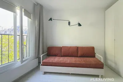 Coin salon dans l'établissement Bright Studio with Open View Voltaire 11th