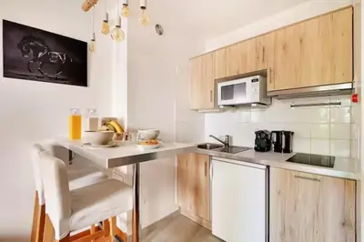 Cuisine ou kitchenette dans l'établissement Sereners - Trocadero
