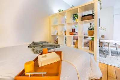Un ou plusieurs lits dans un hébergement de l'établissement 4 Guest Flat Central in Montorgueil