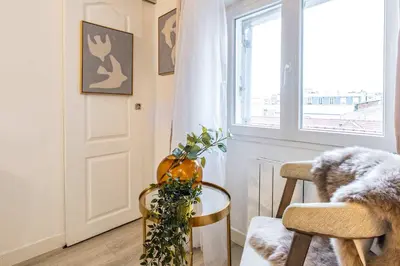 Coin salon dans l'établissement Studio in heart of Paris