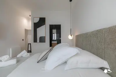 Un ou plusieurs lits dans un hébergement de l'établissement MBA - Échiquier 1 Luxury Apartment Paris Center