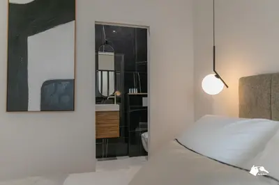 Un ou plusieurs lits dans un hébergement de l'établissement MBA - Échiquier 1 Luxury Apartment Paris Center