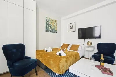Télévision ou salle de divertissement dans l'établissement 5025 Suite Pastou4 - Lovely accommodation in Paris