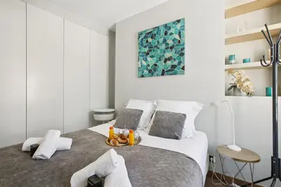 Un ou plusieurs lits dans un hébergement de l'établissement 5025 Suite Pastou4 - Lovely accommodation in Paris