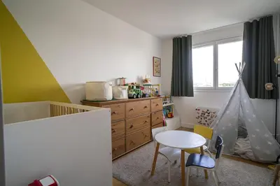 Coin salon dans l'établissement Family nest with Sacré-Coeur and Eiffel Tower view
