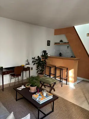 Coin salon dans l'établissement Cosy apartment - Bon Marché