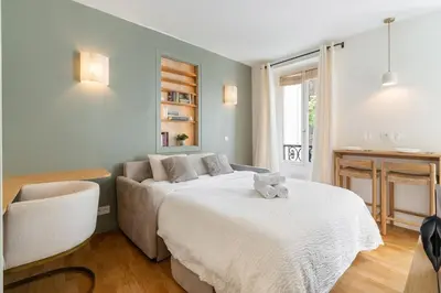 Un ou plusieurs lits dans un hébergement de l'établissement Studio rénové au coeur du 5ème arrondissement
