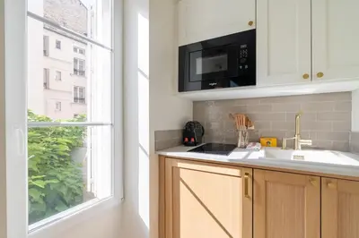 Cuisine ou kitchenette dans l'établissement Studio rénové au coeur du 5ème arrondissement