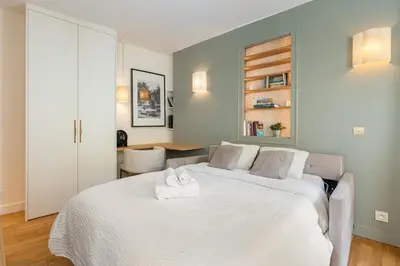 Un ou plusieurs lits dans un hébergement de l'établissement Studio rénové au coeur du 5ème arrondissement