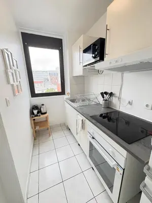 Cuisine ou kitchenette dans l'établissement F3 confortable à 2 min du métro et ambiance cinéma