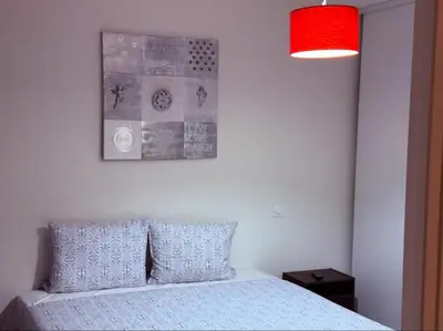Un ou plusieurs lits dans un hébergement de l'établissement Apartment Paris La Défense Eiffel Tower Skyline