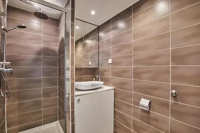 Salle de bains dans l'établissement Modern Suite Champs Elysées Trocadero by SP