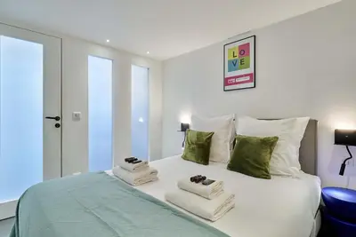 Un ou plusieurs lits dans un hébergement de l'établissement Superb Apartment Le Marais Center of Paris