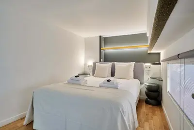 Un ou plusieurs lits dans un hébergement de l'établissement Superb Apartment Le Marais Center of Paris