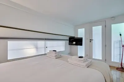 Un ou plusieurs lits dans un hébergement de l'établissement Superb Apartment Le Marais Center of Paris