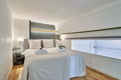 Un ou plusieurs lits dans un hébergement de l'établissement Superb Apartment Le Marais Center of Paris