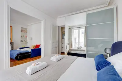 Un ou plusieurs lits dans un hébergement de l'établissement Suite Chapu - Cocon au cœur du 16e arrondissement