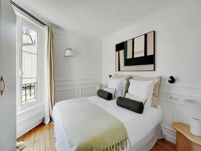Un ou plusieurs lits dans un hébergement de l'établissement Magnificent apartment- 1BR-4P - Tour-Eiffel