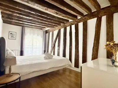 Un ou plusieurs lits dans un hébergement de l'établissement 80 m2-Heart of Le Marais -Sleeps 6