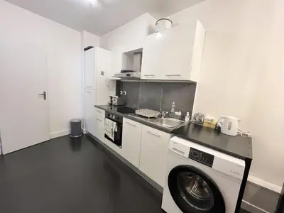 Cuisine ou kitchenette dans l'établissement 80 m2-Heart of Le Marais -Sleeps 6
