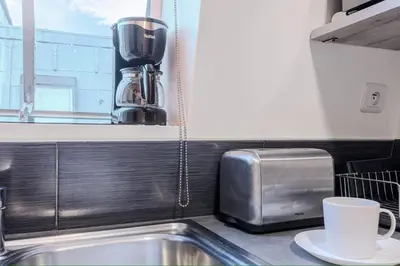 Cuisine ou kitchenette dans l'établissement Studio Faubourg Poissonnière