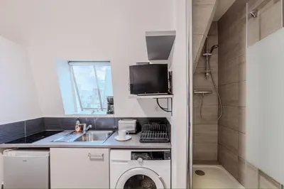 Cuisine ou kitchenette dans l'établissement Studio Faubourg Poissonnière