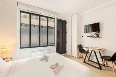 Un ou plusieurs lits dans un hébergement de l'établissement Beautiful Cozy Studio 2P - Paris 12th