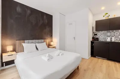 Un ou plusieurs lits dans un hébergement de l'établissement Beautiful Cozy Studio 2P - Paris 12th