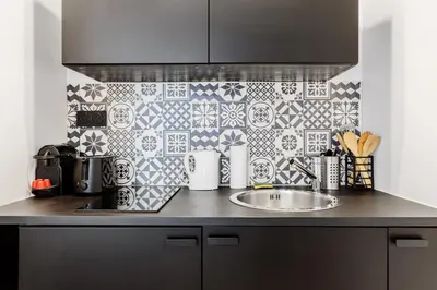 Cuisine ou kitchenette dans l'établissement Beautiful Cozy Studio 2P - Paris 12th