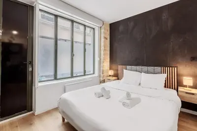 Un ou plusieurs lits dans un hébergement de l'établissement Beautiful Cozy Studio 2P - Paris 12th