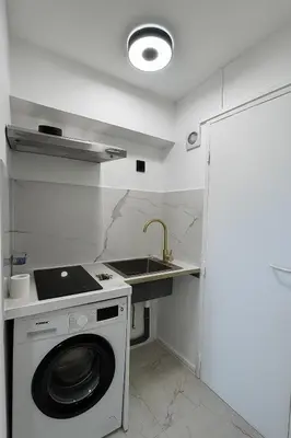 Cuisine ou kitchenette dans l'établissement Paris 16, Lux Studio - Steps from metro 9!