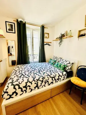 Un ou plusieurs lits dans un hébergement de l'établissement Studio 17ème Batignolles