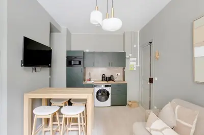 Cuisine ou kitchenette dans l'établissement Charmant appartement 1BR - Village Batignolles