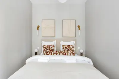 Un ou plusieurs lits dans un hébergement de l'établissement Charmant appartement 1BR - Village Batignolles