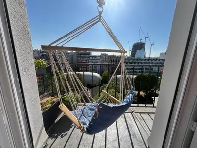 Balcon ou terrasse dans l'établissement Appartement 8 personnes - terrasse sur espaces verts - vue Tour Eiffel