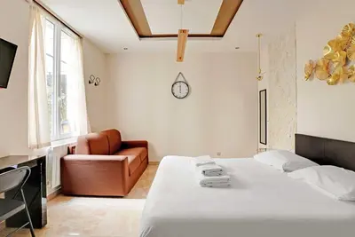 Un ou plusieurs lits dans un hébergement de l'établissement Charming studio - 2P - Montorgueil
