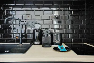 Cuisine ou kitchenette dans l'établissement Charming studio - 2P - Montorgueil