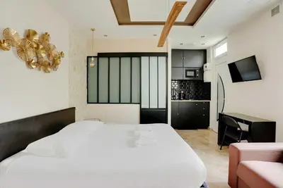 Un ou plusieurs lits dans un hébergement de l'établissement Charming studio - 2P - Montorgueil