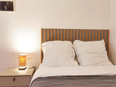 Un ou plusieurs lits dans un hébergement de l'établissement Calm apt 60m2 near Notre-Dame and Seine 2bdrs N4-4b