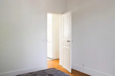 Un ou plusieurs lits dans un hébergement de l'établissement Apartment 3P 20 minutes by subway from Paris