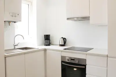 Cuisine ou kitchenette dans l'établissement Apartment 3P 20 minutes by subway from Paris