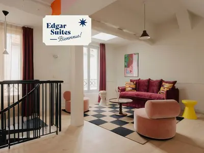 Coin salon dans l'établissement Edgar Suites - Lemercier